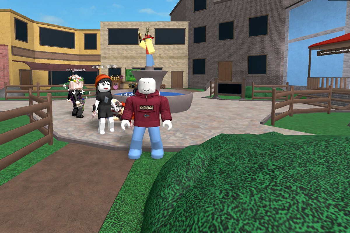 Группа Roblox-аватаров в городской локации Roblox